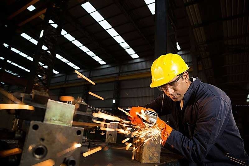 Safety trainee working at an industrial site