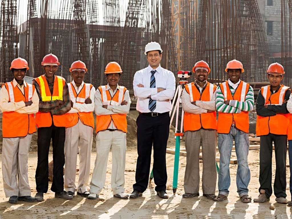 RIFS safety trainees in high-visibility vests and hard hats with their instructor